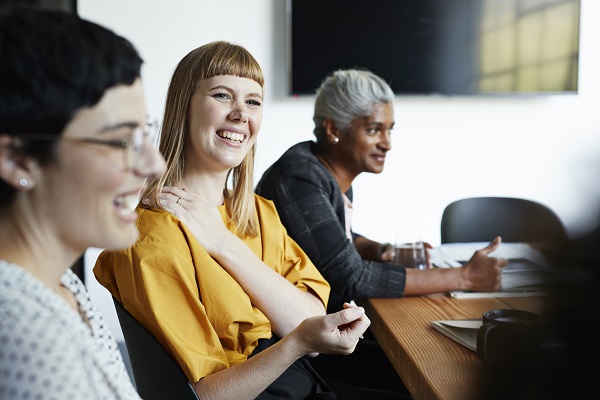 Work colleagues sitting at a table